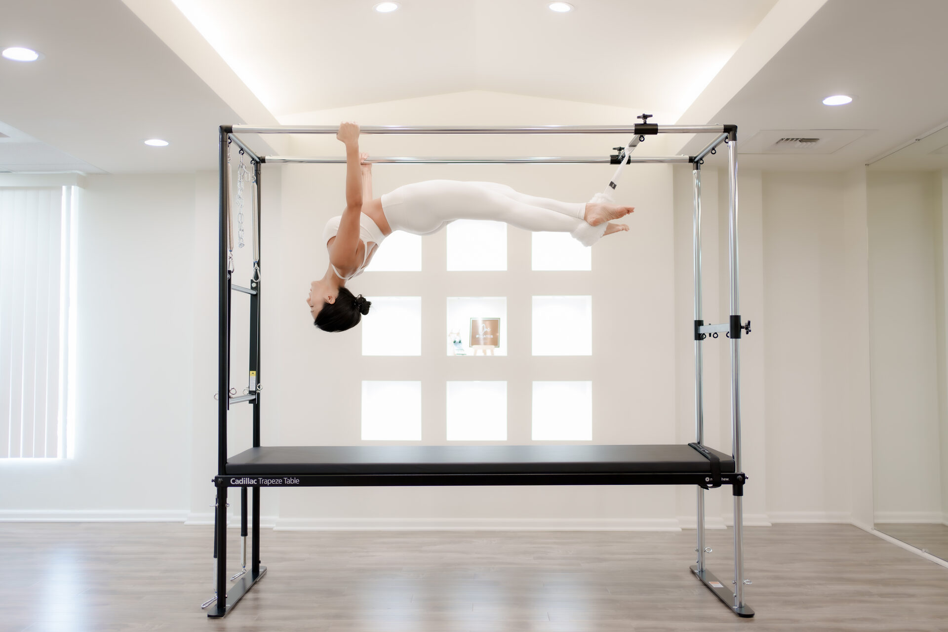 An overhead view of a full-body stretch laid across the Cadillac.